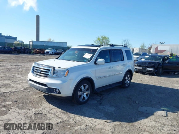 2012 Honda Pilot Touring with VIN 5FNYF4H98CB057659, listed as a IAAI auction lot 41927990 with 140,000 mi miles. Bid and sale history available at carsss.com. Image 6.