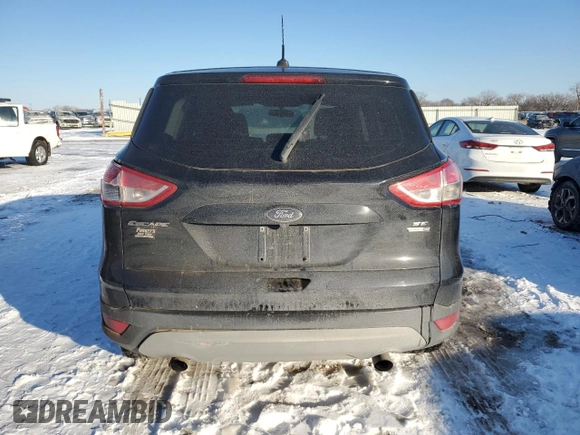 2014 Ford Escape SE z VIN 1FMCU9G95EUA94916, wystawiony jako Copart lot #41660525 z przebiegiem 146 941 mil mil oraz Szkoda całkowita • Salvage title. Historia ofert i sprzedaży dostępna na DreamBid. Obrazek 6.