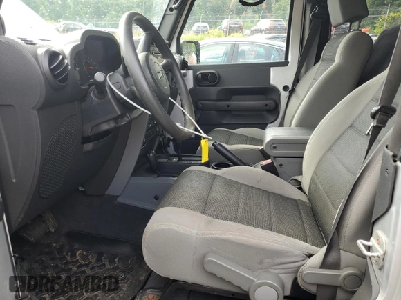 2007 Jeep Wrangler X with VIN 1J4FA24117L202404, listed as a Copart auction lot 58690485 with 126,347 mi miles and Salvage title. Bid and sale history available at DreamBid. Image 7.
