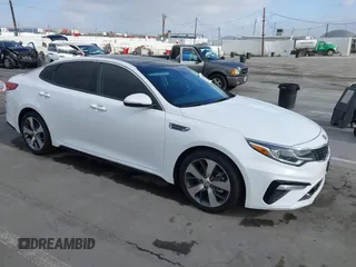 2019 Kia Optima LX z VIN 5XXGT4L39KG363899, wystawiony jako IAAI lot #42246715 z przebiegiem 44 041 mil mil oraz . Historia ofert i sprzedaży dostępna na DreamBid. Obrazek 1.