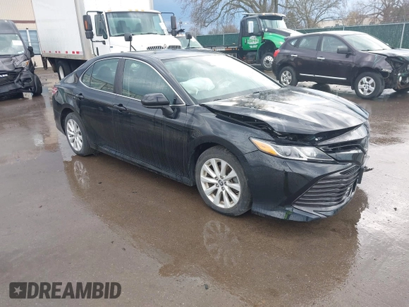 2019 Toyota Camry LE with VIN 4T1B11HK2KU263910, listed as a IAAI auction lot 42060008 with 31,433 mi miles and . Bid and sale history available at DreamBid. Image 1.