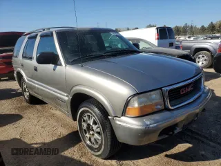 1999 GMC Jimmy SLE with VIN 1GKDT13W1X2537011, listed as a Copart auction lot 76623754 with 212,083 mi miles and Salvage Title. Bid and sale history available at carsss.com. Image 4.