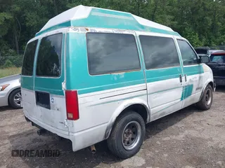 1991 Chevrolet Astro Cargo z VIN 1GBDM19Z7MB202913, wystawiony jako IAAI lot #42363530 z przebiegiem 191 695 mil mil oraz . Historia ofert i sprzedaży dostępna na DreamBid. Obrazek 4.