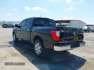 2018 Nissan Titan SV with VIN 1N6AA1EJ4JN529655, listed as a IAAI auction lot 42051405 with 153,599 mi miles and . Bid and sale history available at DreamBid. Image 3.