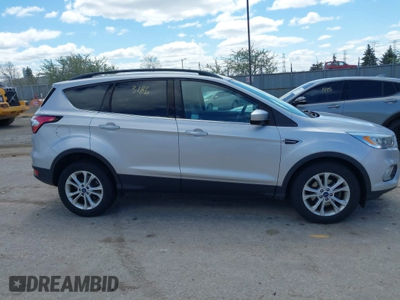 2017 Ford Escape SE with VIN 1FMCU0GD3HUD25445, listed as a IAAI auction lot 42043186 with 90,618 mi miles. Bid and sale history available at carsss.com. Image 13.