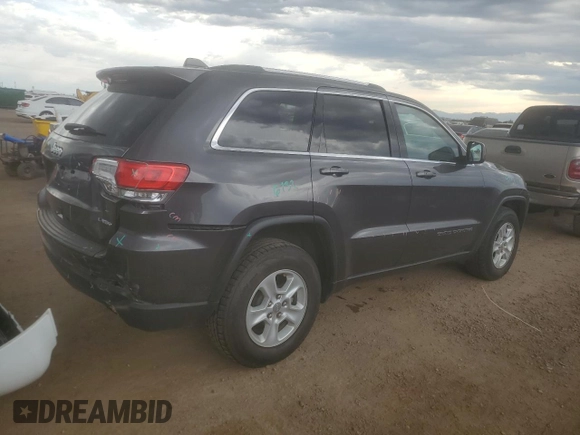 2017 Jeep Grand Cherokee Laredo with VIN 1C4RJFAG9HC653648, listed as a Copart auction lot 63049635 with 72,428 mi miles and Salvage title. Bid and sale history available at DreamBid. Image 3.