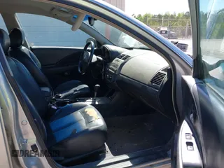 2002 Nissan Altima S with VIN 1N4AL11D12C166490, listed as a IAAI auction lot 42056634 with 203,367 mi miles. Bid and sale history available at carsss.com. Image 5.