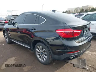 2015 BMW X6 xDrive35i z VIN 5UXKU2C56F0F95429, wystawiony jako IAAI lot #41754635 z przebiegiem 79 503 mil mil oraz . Historia ofert i sprzedaży dostępna na DreamBid. Obrazek 14.