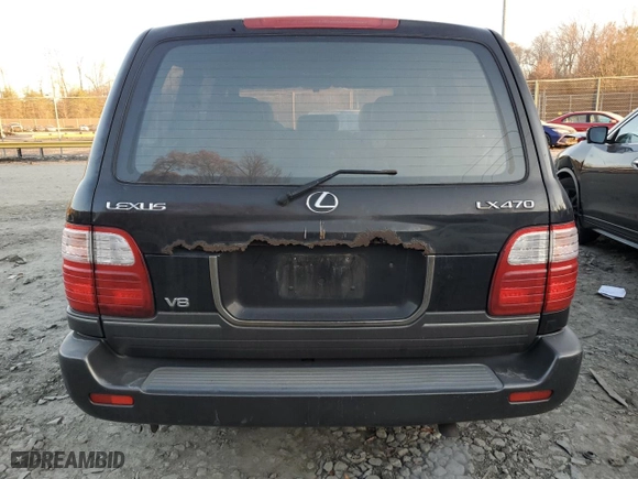 1999 Lexus LX 470 Luxury SUV with VIN JT6HT00W3X0064940, listed as a Copart auction lot 83237774 with NaN miles and Clean Title. Bid and sale history available at carsss.com. Image 6.