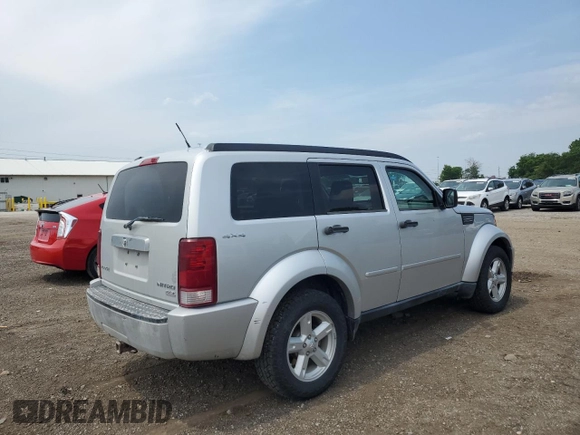 2009 Dodge Nitro SLT with VIN 1D8GU58K09W522094, listed as a Copart auction lot 59765505 with 286,034 mi miles and Salvage title. Bid and sale history available at DreamBid. Image 3.