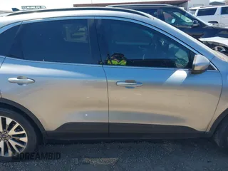 2021 Ford Escape Titanium Hybrid z VIN 1FMCU0DZ3MUB04065, wystawiony jako IAAI lot #41764797 z przebiegiem 28 881 mil mil oraz . Historia ofert i sprzedaży dostępna na DreamBid. Obrazek 14.