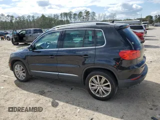 2012 Volkswagen Tiguan SE with VIN WVGAV7AX1CW610349, listed as a Copart auction lot 49250985 with 139,718 mi miles and Salvage Title. Bid and sale history available at DreamBid. Image 2.