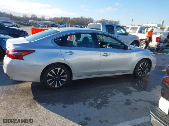2018 Nissan Altima 2.5 SV with VIN 1N4AL3APXJC265944, listed as a IAAI auction lot 41052902 with 142,023 mi miles. Bid and sale history available at carsss.com. Image 13.