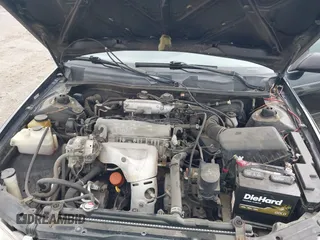 2001 Toyota Camry CE z VIN 4T1BG22K81U054795, wystawiony jako IAAI lot #42359932 z przebiegiem 167 341 mil mil oraz . Historia ofert i sprzedaży dostępna na DreamBid. Obrazek 10.