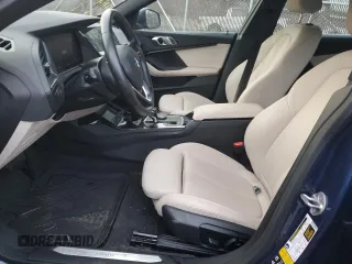 2023 BMW 2 Series 228i xDrive with VIN WBA73AK00P7M34880, listed as a Copart auction lot 77828404 with 8,726 mi miles and Salvage Title. Bid and sale history available at carsss.com. Image 7.