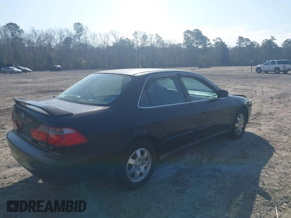 1998 Honda Accord LX z VIN 1HGCG5641WA215469, wystawiony jako IAAI lot #41801430 z przebiegiem 228 903 mil mil oraz . Historia ofert i sprzedaży dostępna na DreamBid. Obrazek 4.