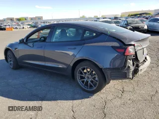 2023 Tesla Model 3 with VIN 5YJ3E1EA4PF556782, listed as a Copart auction lot 55626935 with 26,615 mi miles and Salvage title. Bid and sale history available at DreamBid. Image 2.