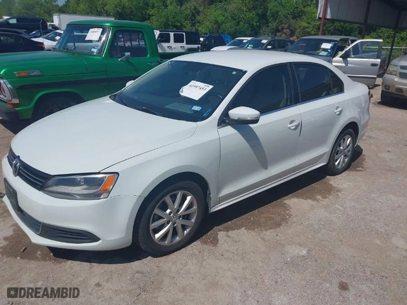 2014 Volkswagen Jetta Sedan SE with VIN 3VWD07AJ2EM310654, listed as a IAAI auction lot 41997453 with 126,801 mi miles. Bid and sale history available at carsss.com. Image 2.