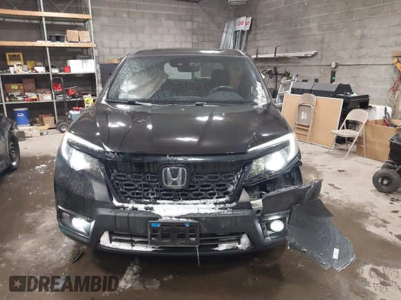 2020 Honda Passport EX-L with VIN 5FNYF8H53LB013931, listed as a IAAI auction lot 41614095 with 68,537 mi miles and . Bid and sale history available at DreamBid. Image 12.