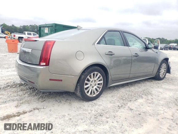 2011 Cadillac CTS with VIN 1G6DA5EYXB0137933, listed as a Copart auction lot 54679985 with 222,010 mi miles and Clean Title. Bid and sale history available at DreamBid. Image 3.
