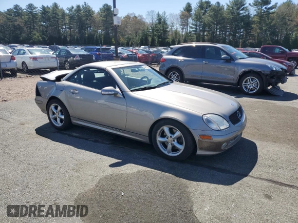 2003 Mercedes-Benz SLK 320 with VIN WDBKK65F33F286090, listed as a Copart auction lot 54711385 with 82,300 mi miles and Salvage title. Bid and sale history available at DreamBid. Image 4.