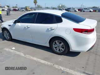 2016 Kia Optima LX z VIN 5XXGT4L3XGG019697, wystawiony jako IAAI lot #42449350 z przebiegiem 87 769 mil mil oraz . Historia ofert i sprzedaży dostępna na DreamBid. Obrazek 3.
