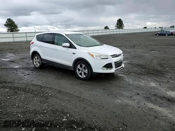 2013 Ford Escape SE z VIN 1FMCU9GX9DUC38478, wystawiony jako Copart lot #51266685 z przebiegiem 102 713 mil mil oraz Szkoda całkowita • Salvage title. Historia ofert i sprzedaży dostępna na DreamBid. Obrazek 12.