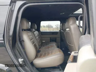 2005 Hummer H2 SUV z VIN 5GRGN23UX5H106375, wystawiony jako IAAI lot #41997745 z przebiegiem 152 827 mil mil oraz . Historia ofert i sprzedaży dostępna na DreamBid. Obrazek 8.