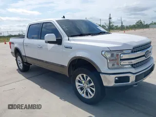 2019 Ford F-150 XL with VIN 1FTEW1E55KKE88920, listed as a IAAI auction lot 42045073 with 137,741 mi miles and . Bid and sale history available at DreamBid. Image 1.