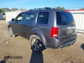 2015 Honda Pilot EX-L with VIN 5FNYF4H59FB060023, listed as a IAAI auction lot 41327793 with 197,981 mi miles and . Bid and sale history available at carsss.com. Image 3.