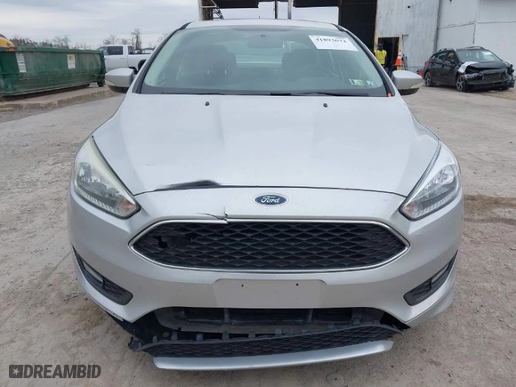 2015 Ford Focus SE with VIN 1FADP3F24FL297665, listed as a IAAI auction lot 41893672 with 105,719 mi miles. Bid and sale history available at carsss.com. Image 6.