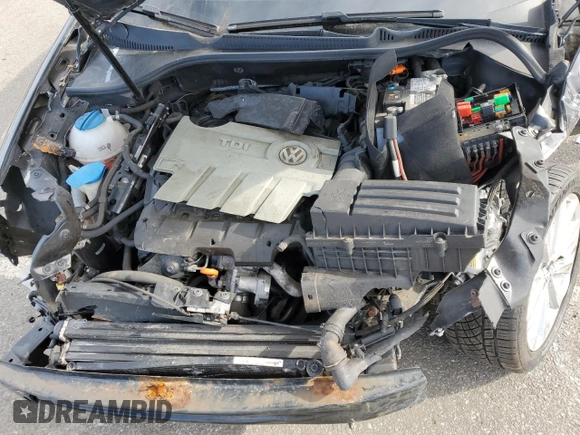 2012 Volkswagen Golf TDI with VIN WVWNM7AJ8CW302793, listed as a Copart auction lot 45277555 with 128,113 mi miles and Salvage title. Bid and sale history available at DreamBid. Image 13.