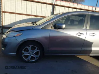 2010 Mazda 5 Sport z VIN JM1CR2W30A0384041, wystawiony jako IAAI lot #41134158 z przebiegiem 178 540 mil mil oraz . Historia ofert i sprzedaży dostępna na DreamBid. Obrazek 19.