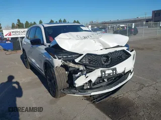 2022 Acura MDX w/A-Spec Package with VIN 5J8YE1H01NL039590, listed as a IAAI auction lot 41336100 with 38,720 mi miles. Bid and sale history available at carsss.com. Image 1.