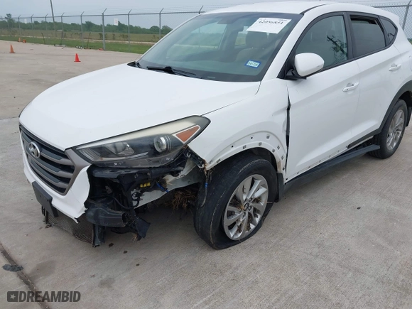 2016 Hyundai Tucson SE with VIN KM8J23A41GU232302, listed as a IAAI auction lot 42056851 with 119,159 mi miles. Bid and sale history available at carsss.com. Image 6.