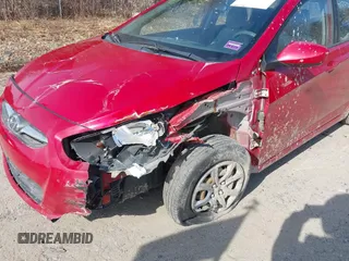 2014 Hyundai Accent GLS with VIN KMHCT4AE7EU675166, listed as a IAAI auction lot 41897417 with 164,738 mi miles and . Bid and sale history available at DreamBid. Image 6.