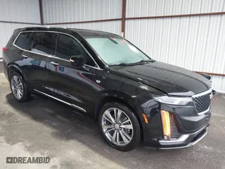 2020 Cadillac XT6 FWD Premium Luxury with VIN 1GYKPCRS9LZ177120, listed as a IAAI auction lot 41608960 with 63,109 mi miles. Bid and sale history available at carsss.com. Image 1.