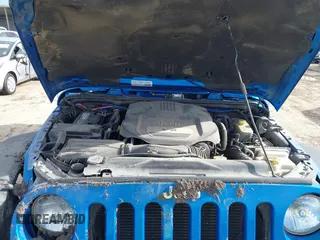 2015 Jeep Wrangler Unlimited Rubicon with VIN 1C4BJWFG5FL558348, listed as a IAAI auction lot 41460025 with 106,012 mi miles. Bid and sale history available at carsss.com. Image 10.