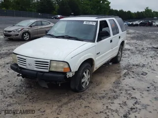2000 Oldsmobile Bravada with VIN 1GHDT13W3Y2226476, listed as a Copart auction lot 60372764 with 223984 miles and Salvage Title. Bid and sale history available at carsss.com. Image 2.