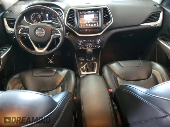 2018 Jeep Cherokee Overland with VIN 1C4PJMJXXJD594749, listed as a Copart auction lot 56049145 with 178,471 mi miles and Salvage title. Bid and sale history available at DreamBid. Image 8.