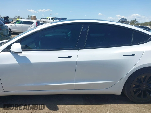 2022 Tesla Model 3 Long Range with VIN 5YJ3E1EB1NF289719, listed as a IAAI auction lot 41968273 with 73,368 mi miles and . Bid and sale history available at DreamBid. Image 15.