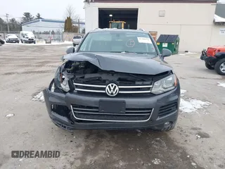 2012 Volkswagen Touareg Sport z VIN WVGEF9BP4CD008517, wystawiony jako IAAI lot #41386971 z przebiegiem 179 306 mil mil oraz . Historia ofert i sprzedaży dostępna na DreamBid. Obrazek 6.