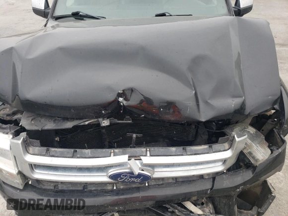 2015 Ford Expedition Max Platinum z VIN 1FMJK1MT4FEF31928, wystawiony jako Copart lot #76301634 z przebiegiem 193 529 mil mil oraz Szkoda całkowita • Salvage title. Historia ofert i sprzedaży dostępna na DreamBid. Obrazek 13.