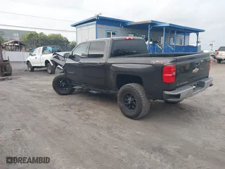 2014 Chevrolet Silverado 1500 LT with VIN 3GCUKREH4EG427604, listed as a IAAI auction lot 41403243 with 133,467 mi miles. Bid and sale history available at carsss.com. Image 3.
