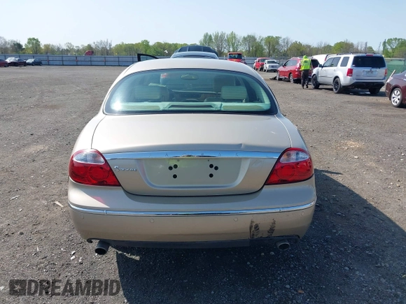 2005 Jaguar S-Type with VIN SAJWA01T95FN22745, listed as a IAAI auction lot 41898269 with 57,614 mi miles and . Bid and sale history available at DreamBid. Image 16.
