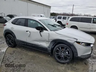 2024 Mazda CX-30 S Select Sport with VIN 3MVDMBBM2RM660521, listed as a Copart auction lot 48143035 with 4,142 mi miles and Salvage Title. Bid and sale history available at DreamBid. Image 4.