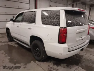 2018 Chevrolet Tahoe Commercial with VIN 1GNSKDEC1JR240868, listed as a IAAI auction lot 41608806 with 138,126 mi miles. Bid and sale history available at carsss.com. Image 3.