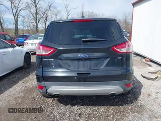 2015 Ford Escape SE z VIN 1FMCU0G73FUA15318, wystawiony jako IAAI lot #41797483 z przebiegiem 85 736 mil mil oraz . Historia ofert i sprzedaży dostępna na DreamBid. Obrazek 16.