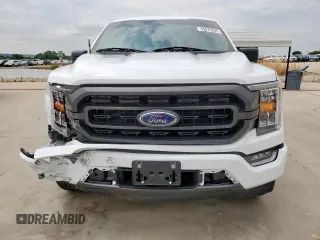 2023 Ford F-150 XL с VIN 1FTEW1CPXPKF70427, выставлен на аукционе Copart как лот 59579585 с пробегом 23 217 миль миль и Списание • Salvage title. История ставок и продаж доступна на DreamBid. Изображение 5.