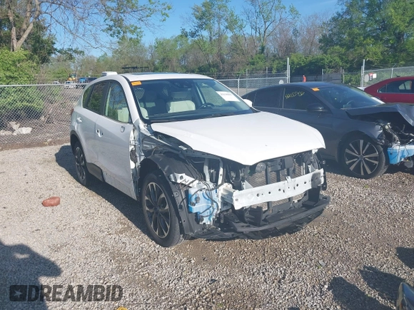 2016 Mazda CX-5 Grand Touring with VIN JM3KE4DY1G0680431, listed as a IAAI auction lot 42136637 with 166,348 mi miles. Bid and sale history available at carsss.com. Image 1.